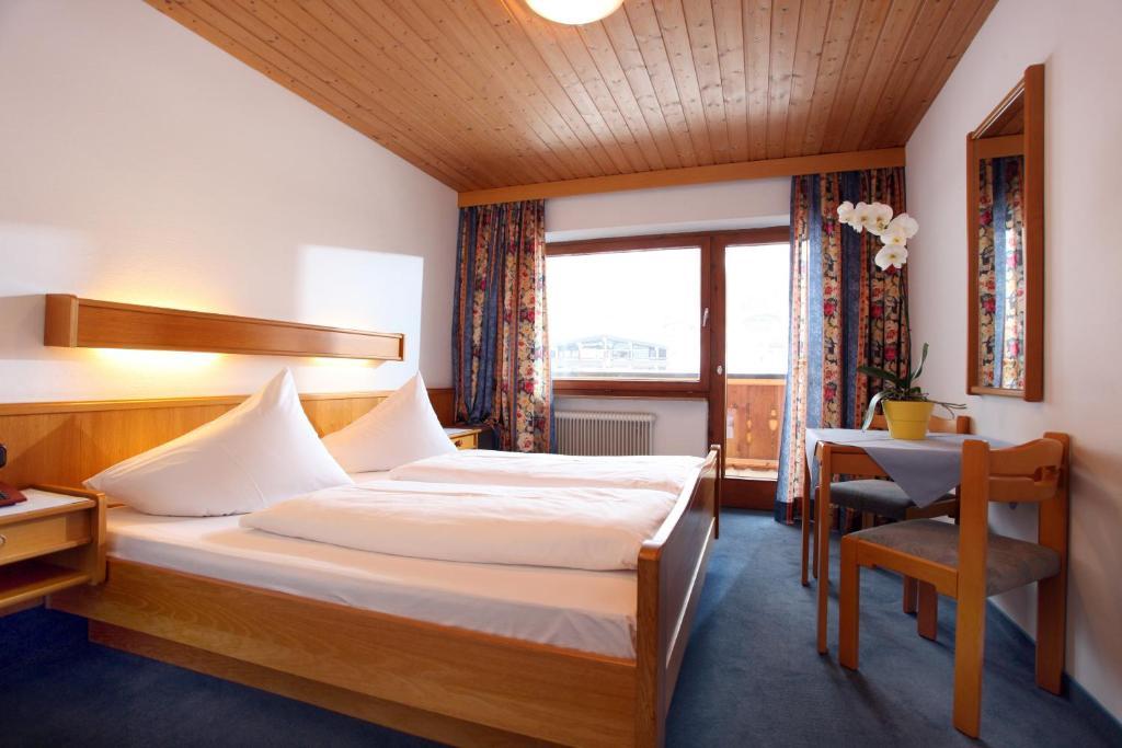 Hotel Taxacher Kirchberg in Tirol Quarto foto